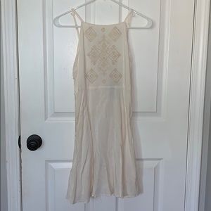 f21 cream mini dress with ties on the side